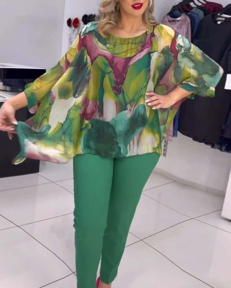 Blouse met ronde hals en vleermuismouwen met print