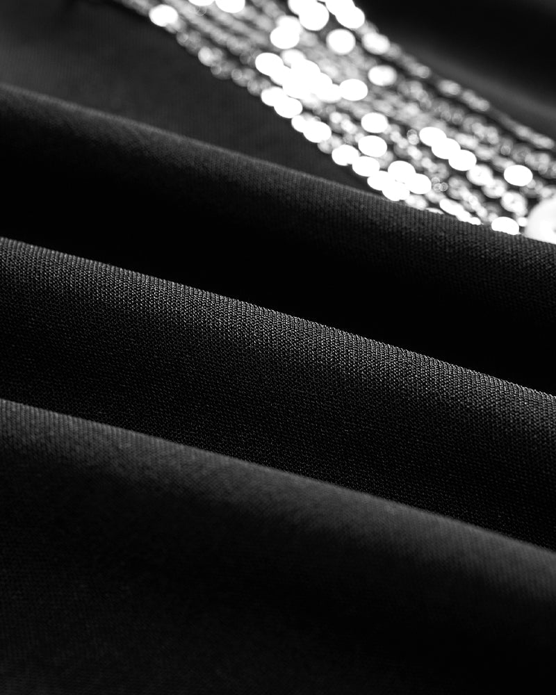 Casual top met knopen en pailletten