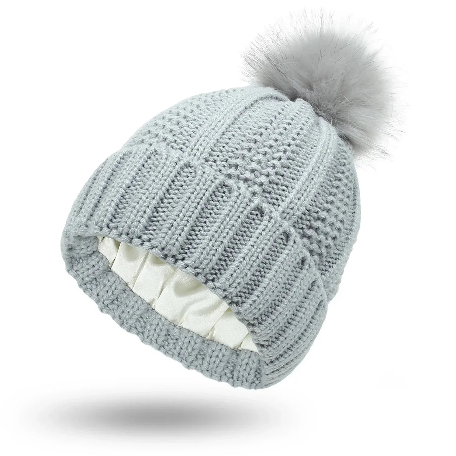 Gebreide beanie muts - dames wintermuts met nepbont pompon