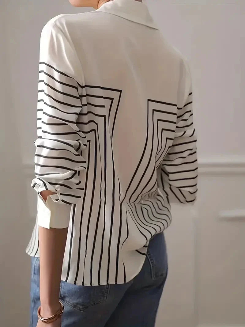 Witte blouse met geometrische strepen