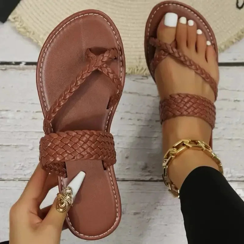 Gevlochten slip-on sandalen