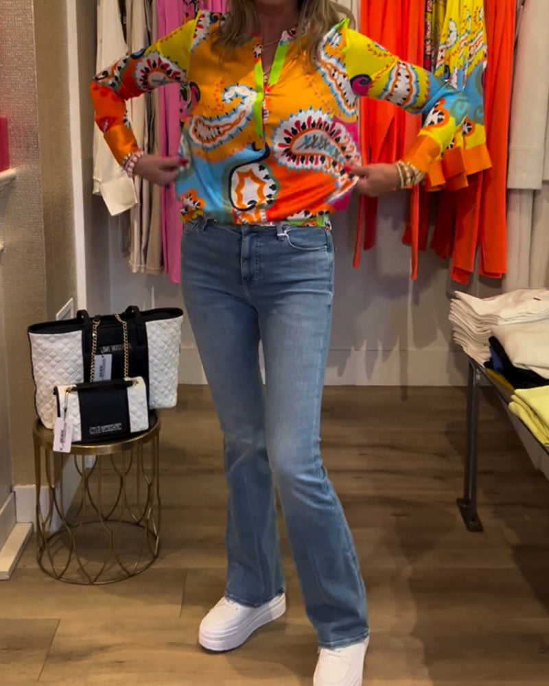 Blouse met lange mouwen en kleurrijke V-hals met print