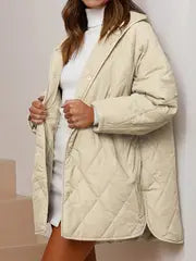 Gewatteerde puffer zwarte en beige winterjas voor dames - warm en oversized