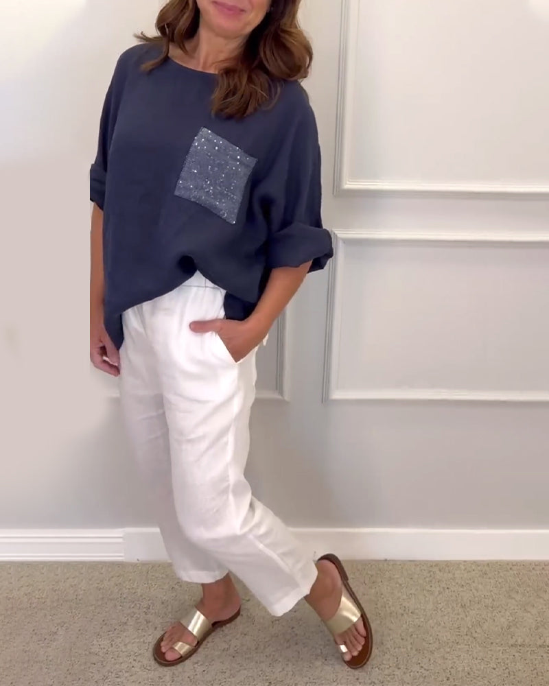 Top met ronde hals en paillettenzakken