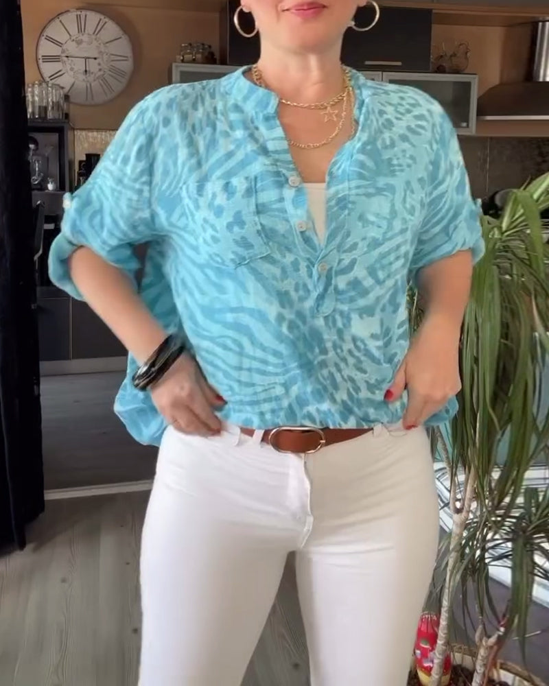 Bedrukte blouse met V-hals, zak met knopen en driekwart mouwen