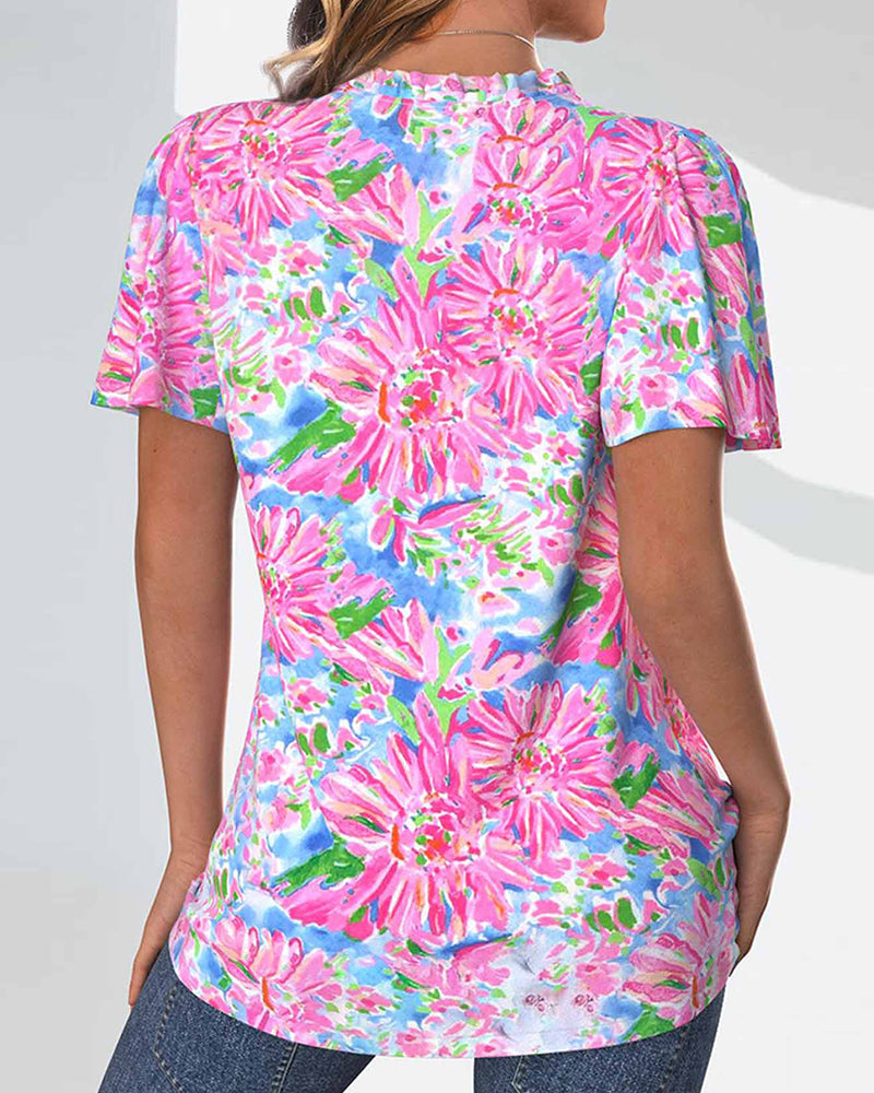 Blouse met korte mouwen en bloemen en knopen