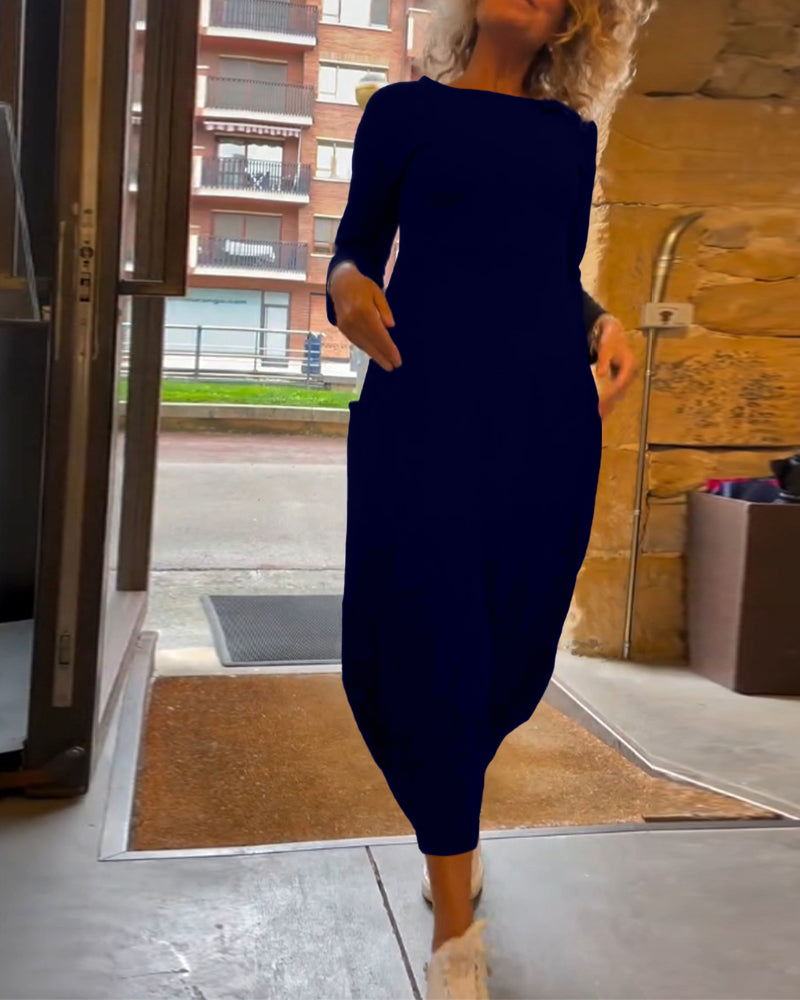 Effen kleur jurk met ronde hals lange mouw en zak