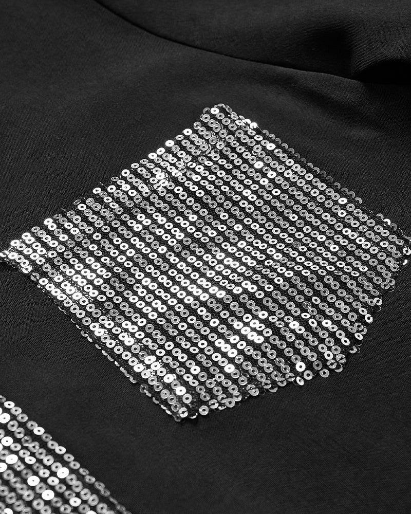 Casual top met knopen en pailletten