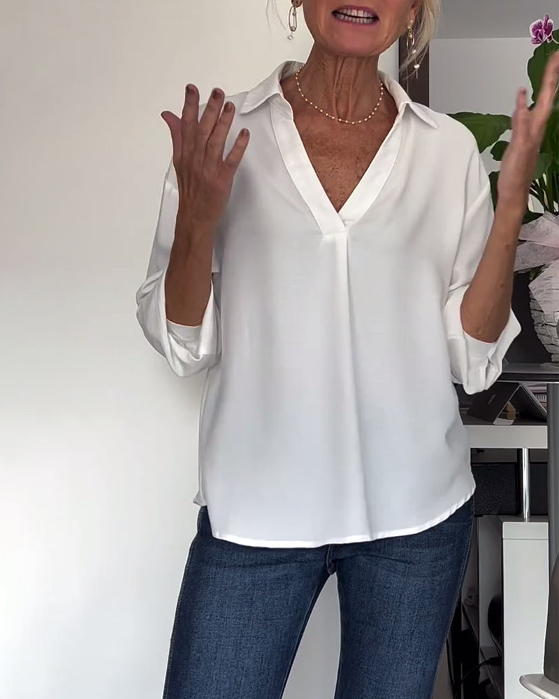 Eenvoudig topje met revers en lange mouwen in effen kleur