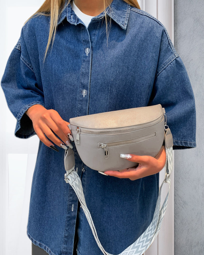 Schoudertas met rits en contrasterende banden