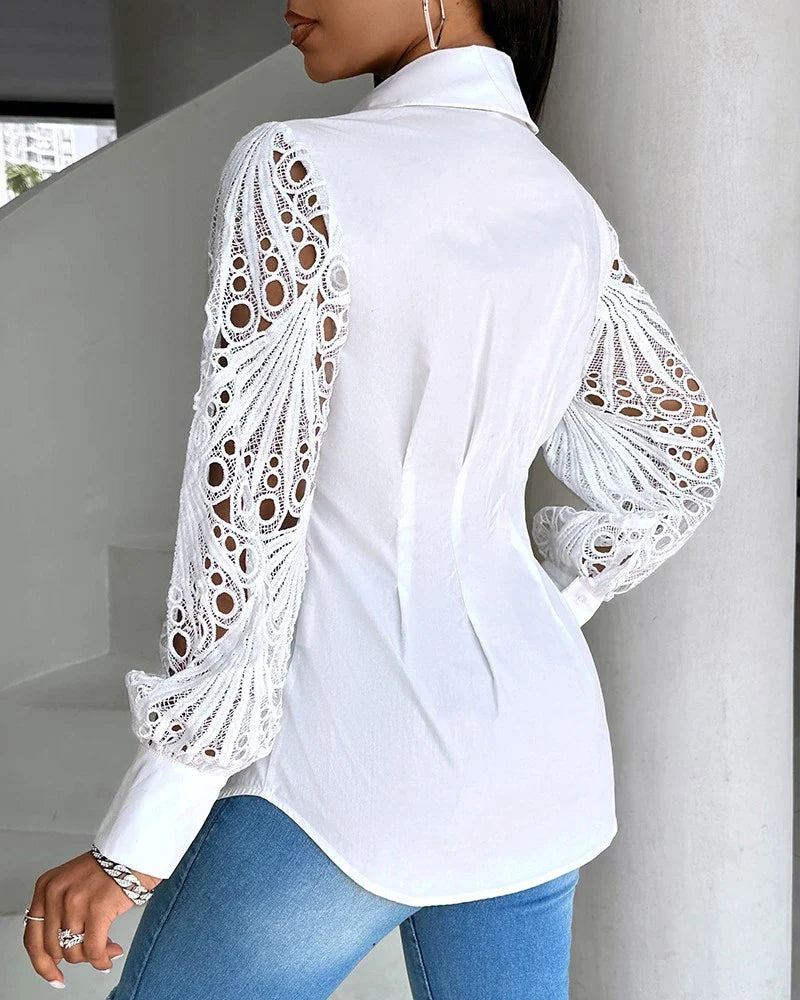 Witte blouse met kanten mouwen