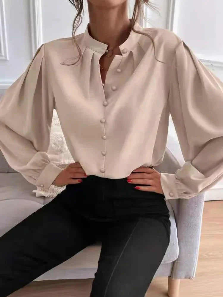 Beige blouse met lange mouwen en knoopsluiting