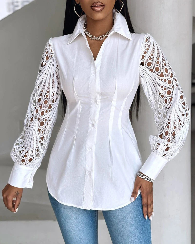 Witte blouse met kanten mouwen