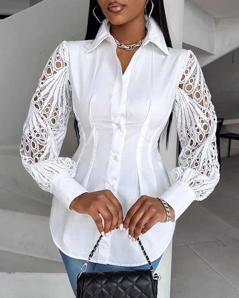 Witte blouse met kanten mouwen