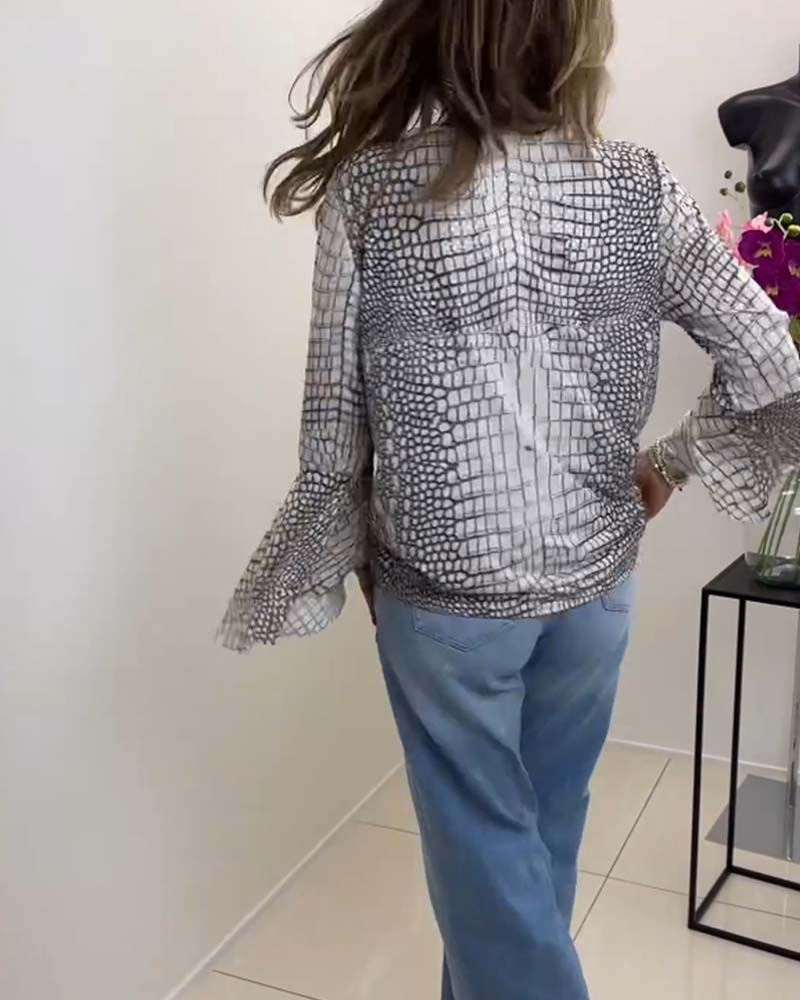 Blouse met bloemmotief en koord