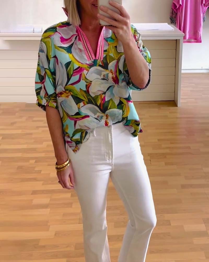 Blouse met opstaande kraag en halve mouw met bloemenprint