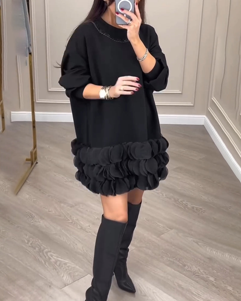 Elegante jurk met patchwork bloemblaadjes