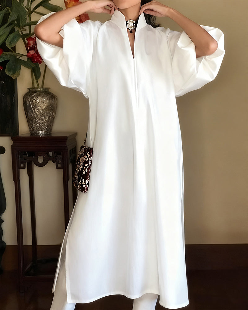 Elegante effen jurk met V-hals en split